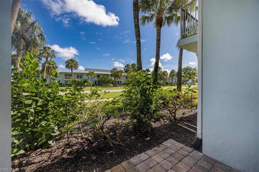 626 12th Avenue South, Unit 626 Naples, FL 34102 - Photo 35 of 50 a view of a yard