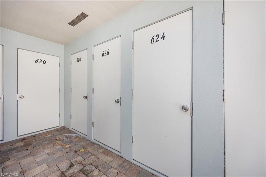 626 12th Avenue South, Unit 626 Naples, FL 34102 - Photo 4 of 50 a view of a hallway with closet area