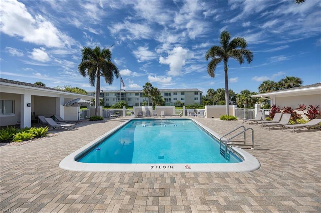 626 12th Avenue South, Unit 626 Naples, FL 34102 - Photo 47 of 50 a view of outdoor space yard and swimming pool
