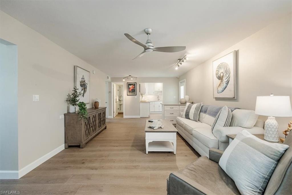 626 12th Avenue South, Unit 626 Naples, FL 34102 - Photo 9 of 50 a living room with furniture
