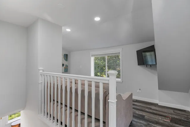 a view of hallway with furniture