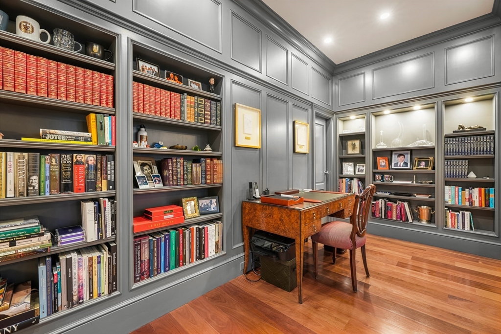 314 Commonwealth Avenue, Unit 2 Boston, MA 02115 - Photo 17 of 31 a living room with furniture a bookshelf and a book shelf