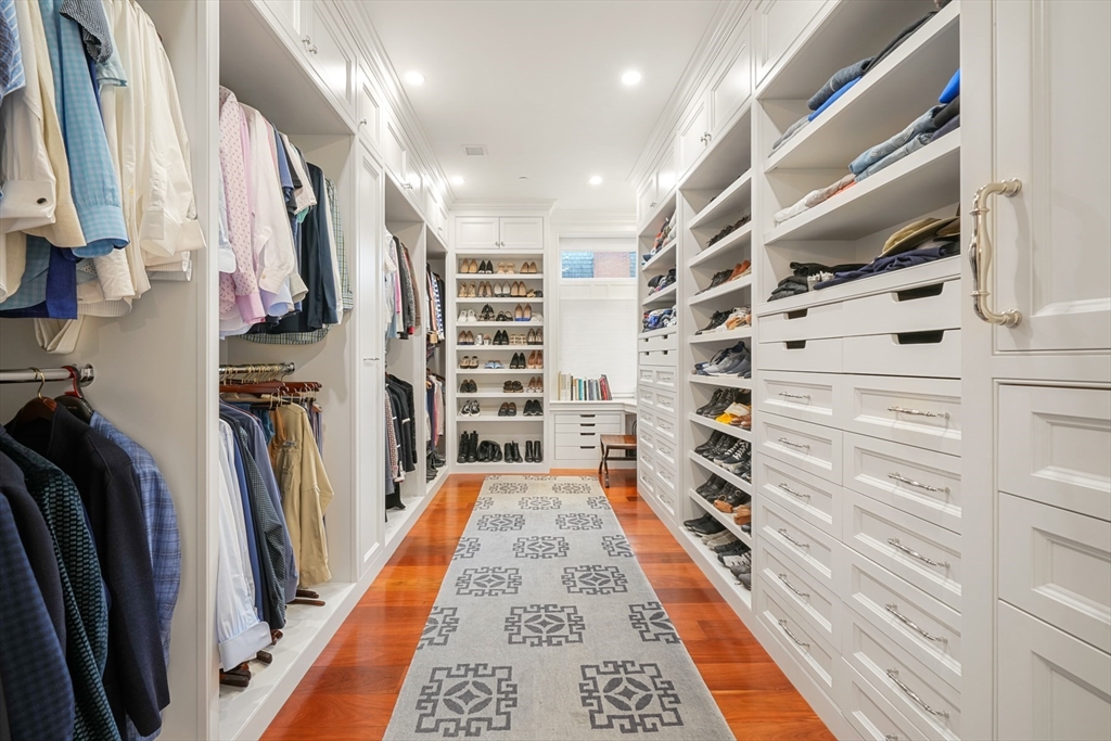 314 Commonwealth Avenue, Unit 2 Boston, MA 02115 - Photo 28 of 31 a view of walk in closet with clothes and shoes