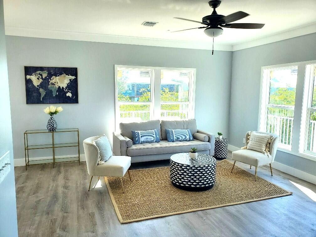27453 Antigua Road Summerland Key, FL 33042 - Photo 11 of 20 a living room with furniture and a window