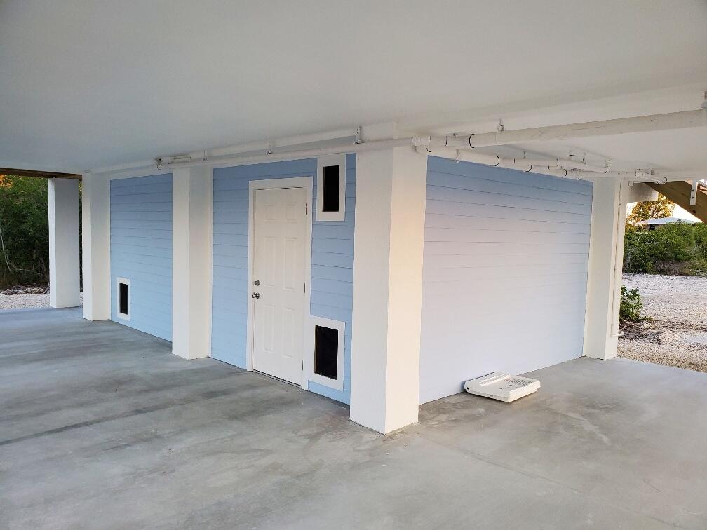 27453 Antigua Road Summerland Key, FL 33042 - Photo 15 of 20 a view of a room with a utility room