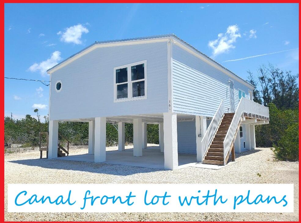 27453 Antigua Road Summerland Key, FL 33042 - Photo 2 of 20 a front view of a house