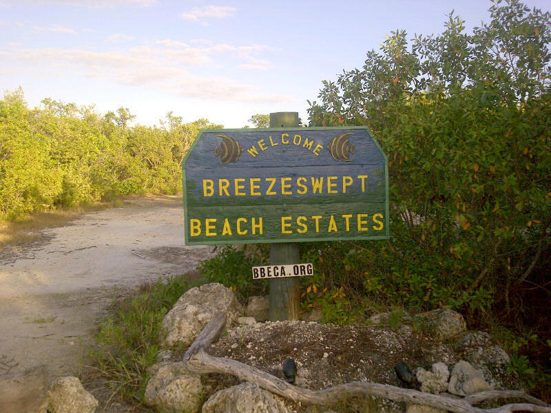 27453 Antigua Road Summerland Key, FL 33042 - Photo 3 of 20 a sign that is sitting on a brick wall