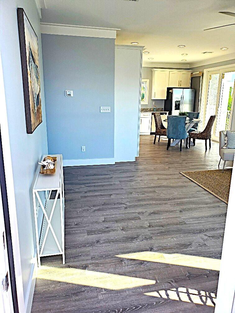27453 Antigua Road Summerland Key, FL 33042 - Photo 10 of 20 a view of dining room with furniture and wooden floor