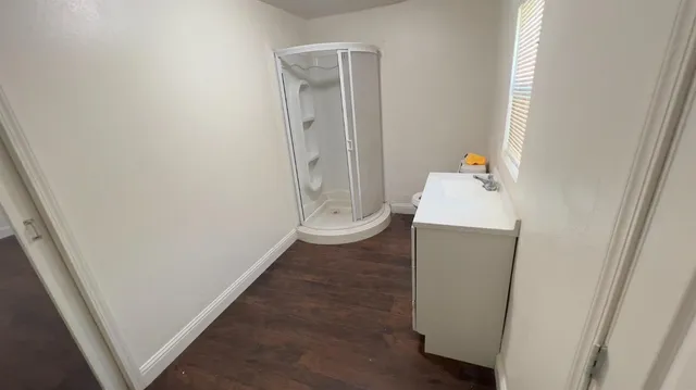 a view of bathroom with a sink and toilet