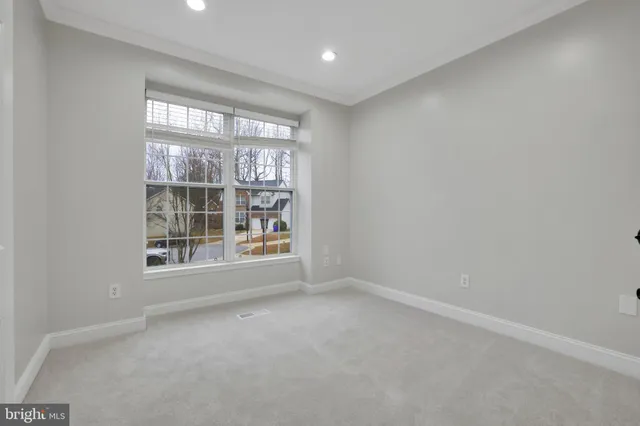 a view of a livingroom with a ceiling fan