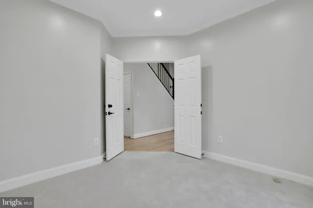 a bathroom with a sink a toilet and a shower