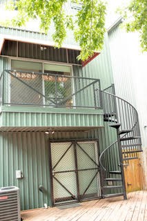 1315 Buckner Street Houston, TX 77019 - Photo 23 of 23 a view of a house with a wooden deck