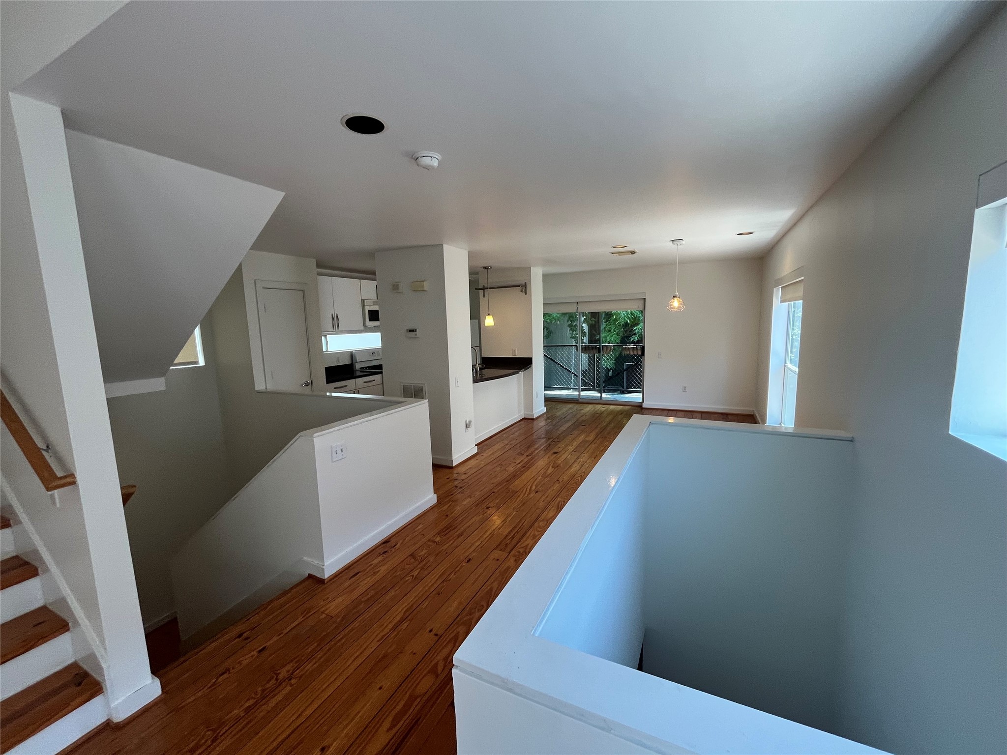 1315 Buckner Street Houston, TX 77019 - Photo 6 of 23 a view of a kitchen with wooden floor and a sink