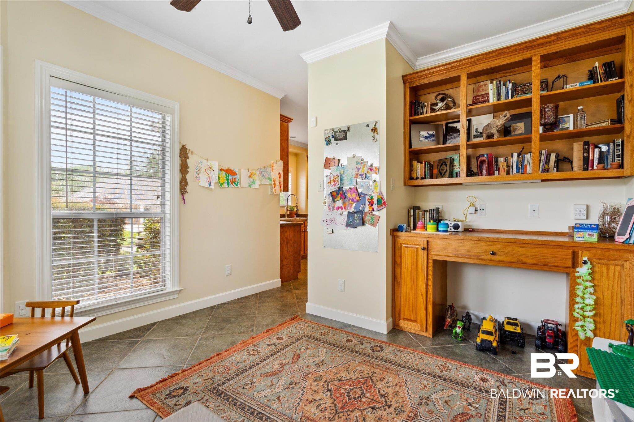 1561 William Dunn Way Mobile, AL 36695 - Photo 10 of 28 Tiled office space featuring sink, crown molding, ceiling fan, and a wealth of natural light
