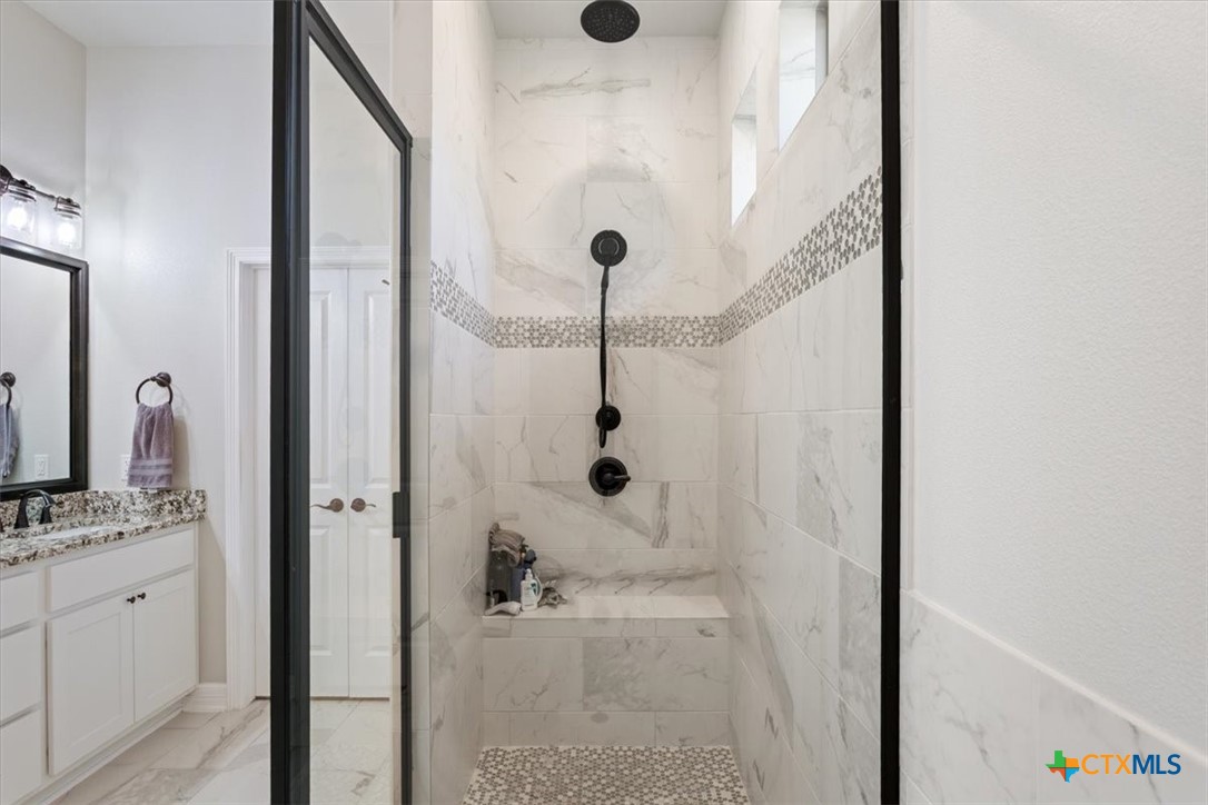 102 Rancho Del Lago Lane Belton, TX 76513 - Photo 22 of 40 a bathroom with a shower