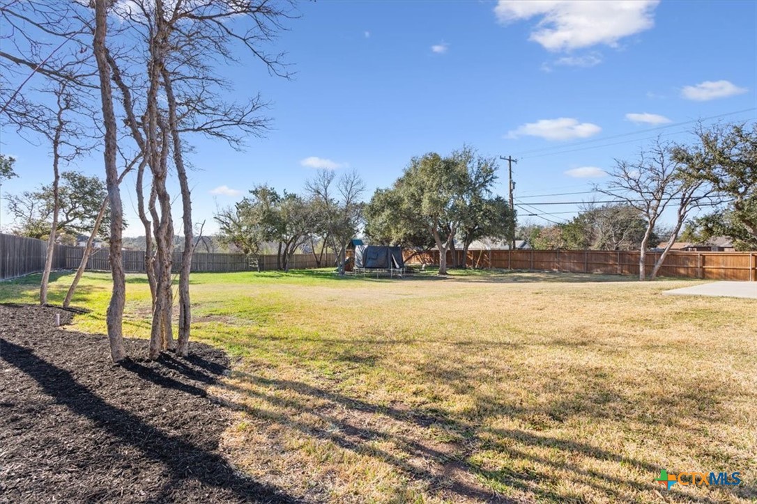 102 Rancho Del Lago Lane Belton, TX 76513 - Photo 34 of 40 a view of a yard with swimming pool