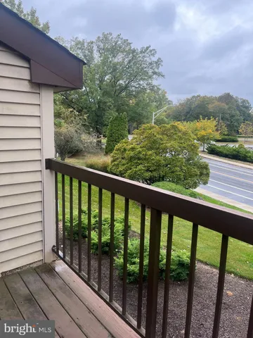 a view of a balcony with an outdoor space