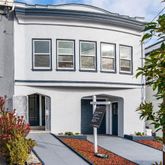 a front view of a house with an outdoor space