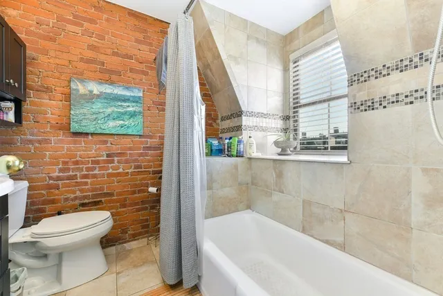a bathroom with a sink and a bathtub