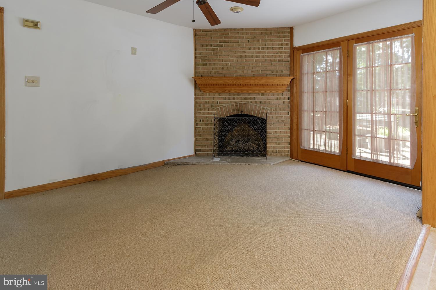 118 Peach Road Marlton, NJ 08053 - Photo 12 of 27 Family room with gas fireplace and doors to deck