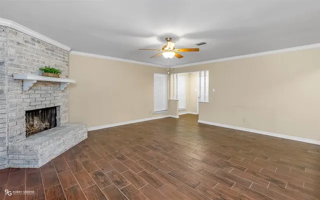 a view of an empty room and window