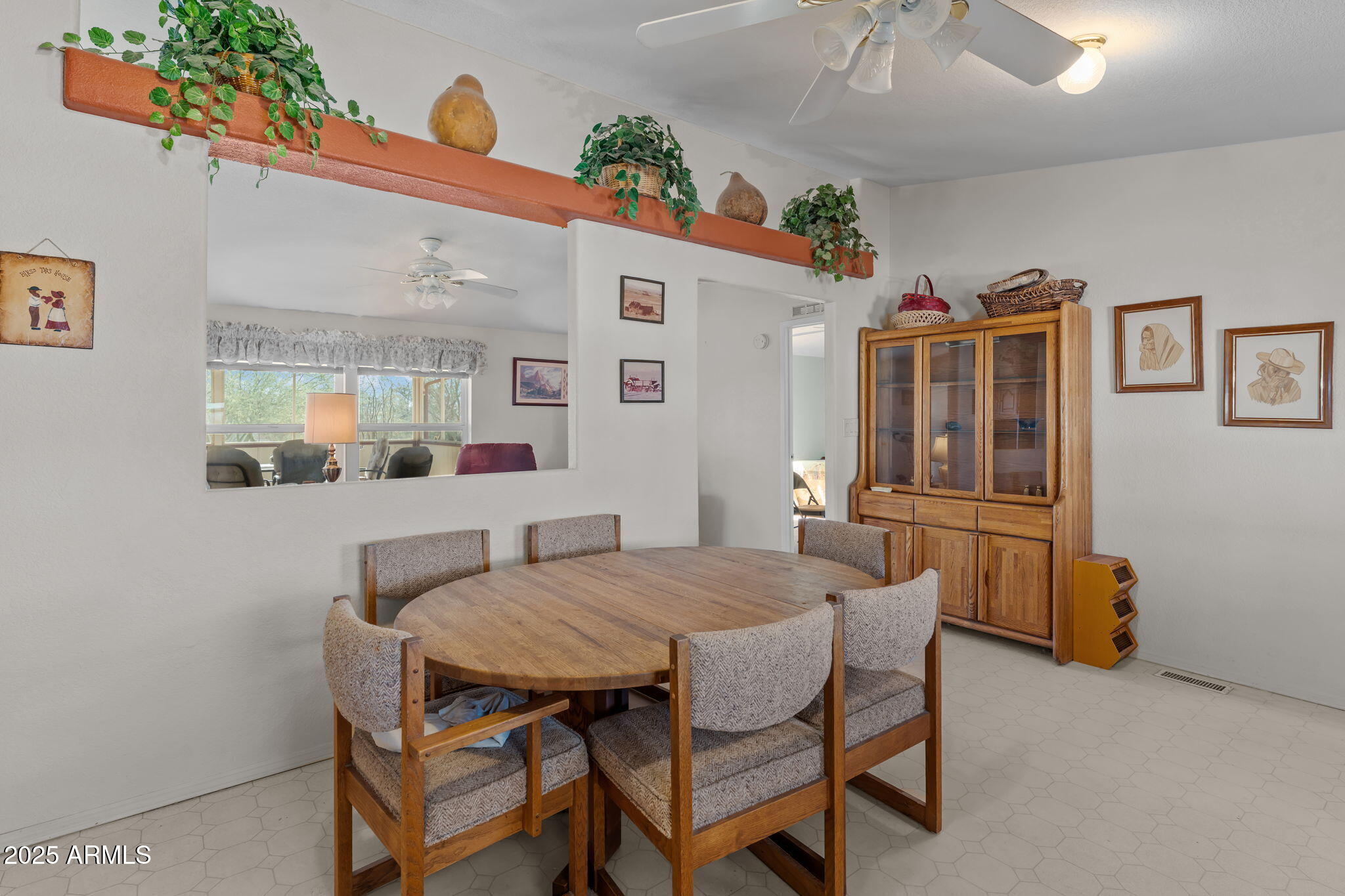 50910 West Long Rifle Road Aguila, AZ 85320 - Photo 15 of 59 a dining room with furniture and window