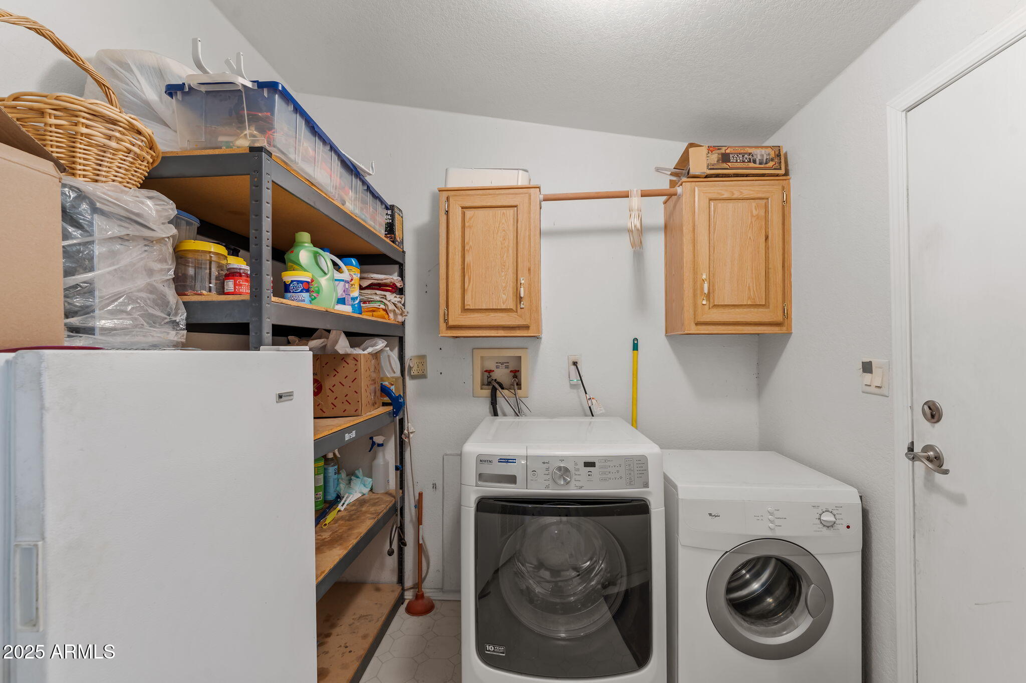 50910 West Long Rifle Road Aguila, AZ 85320 - Photo 16 of 59 a utility room with dryer and washer