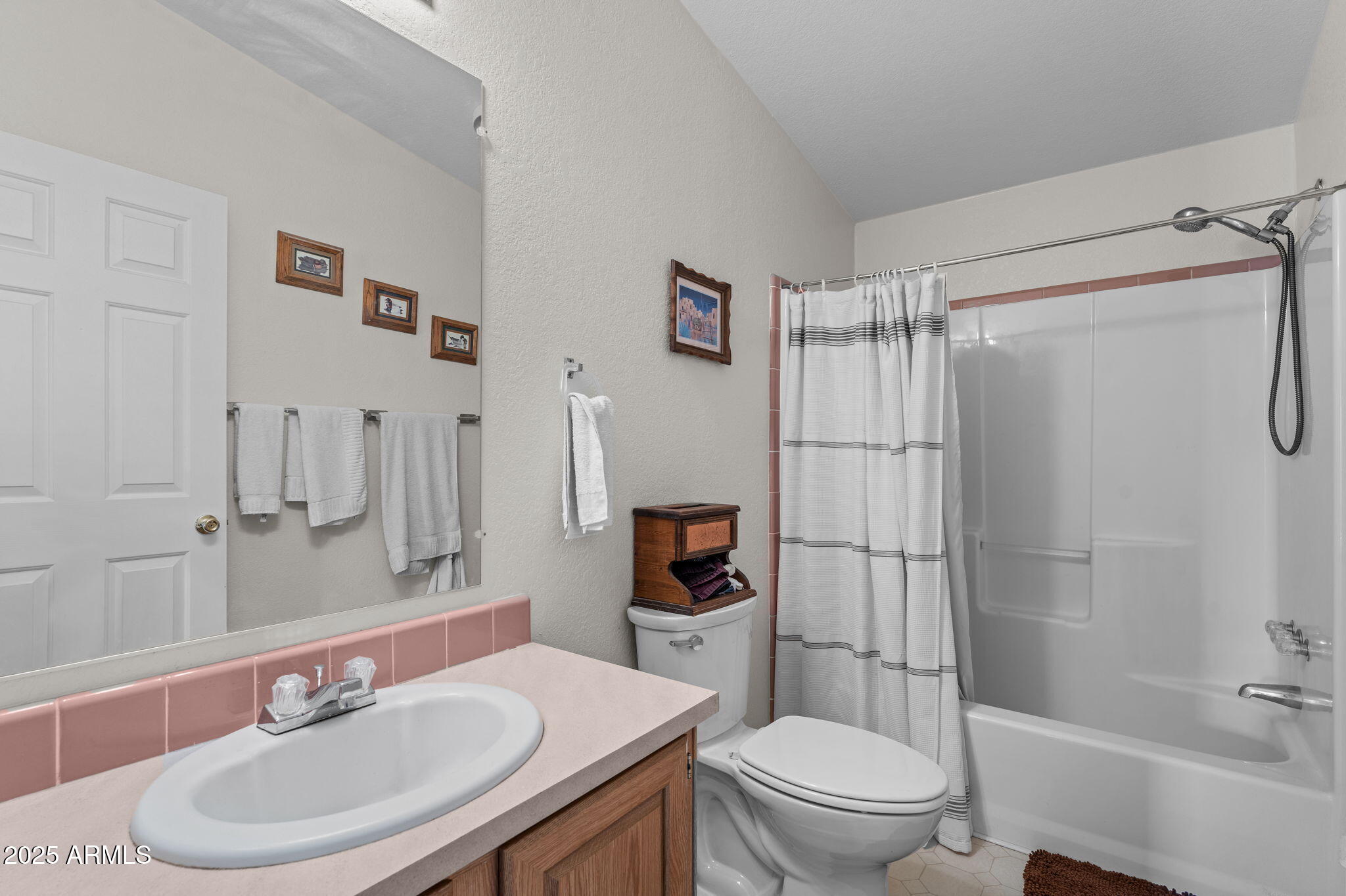 50910 West Long Rifle Road Aguila, AZ 85320 - Photo 21 of 59 a bathroom with a sink toilet and shower
