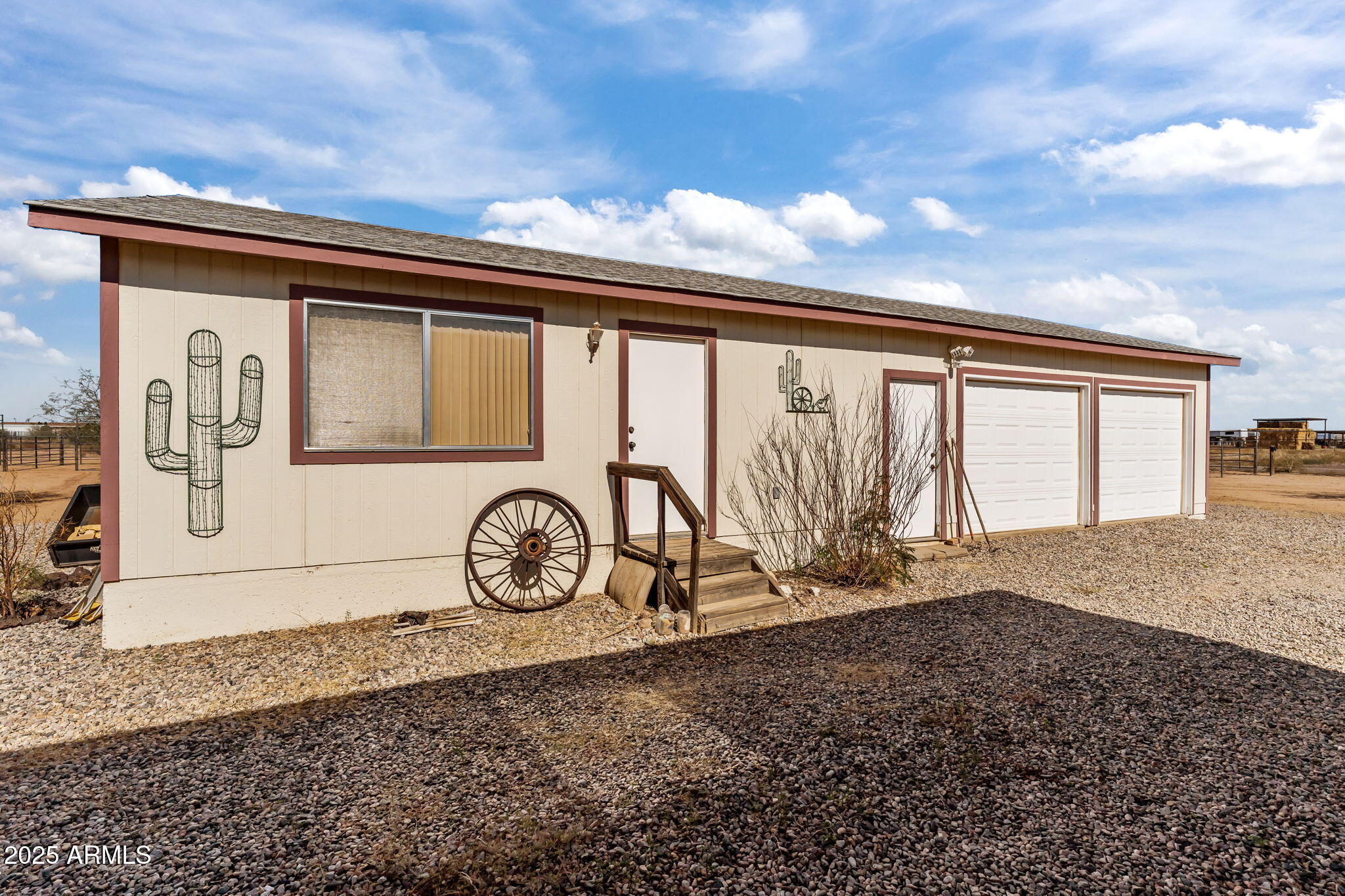 50910 West Long Rifle Road Aguila, AZ 85320 - Photo 25 of 59 a view of a house with large windows