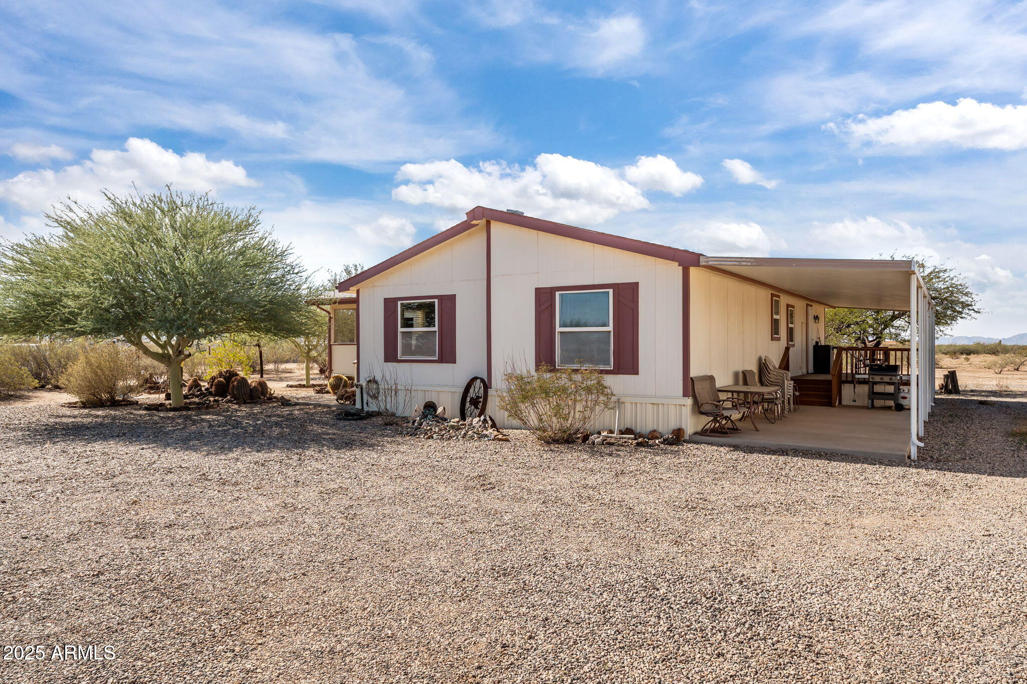50910 West Long Rifle Road Aguila, AZ 85320 - Photo 7 of 59 a view of a house with a yard