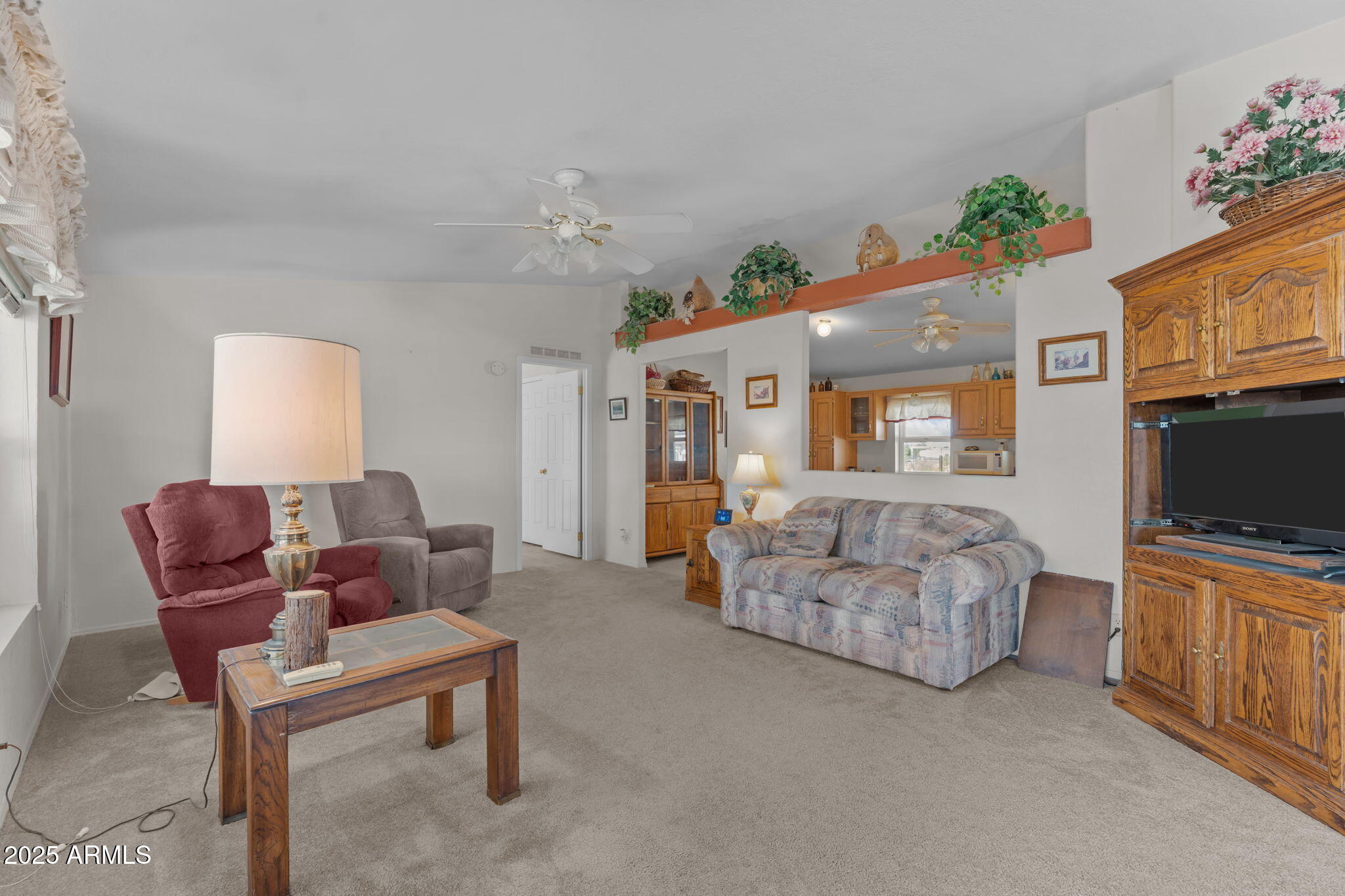50910 West Long Rifle Road Aguila, AZ 85320 - Photo 9 of 59 a living room with furniture and a flat screen tv