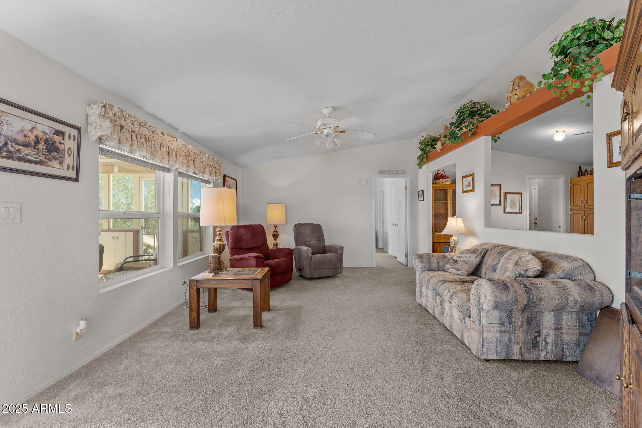 50910 West Long Rifle Road Aguila, AZ 85320 - Photo 10 of 59 a living room with furniture and a window