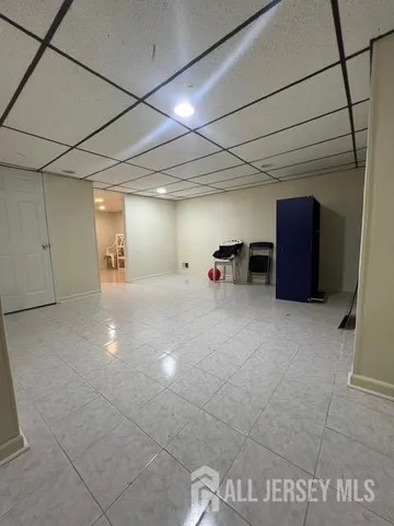 a aerial view of a house with swimming pool