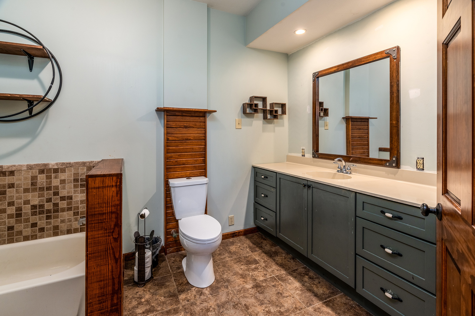 9242 East Park Street Road Du Quoin, IL 62832 - Photo 18 of 44 a bathroom with a toilet a sink and mirror