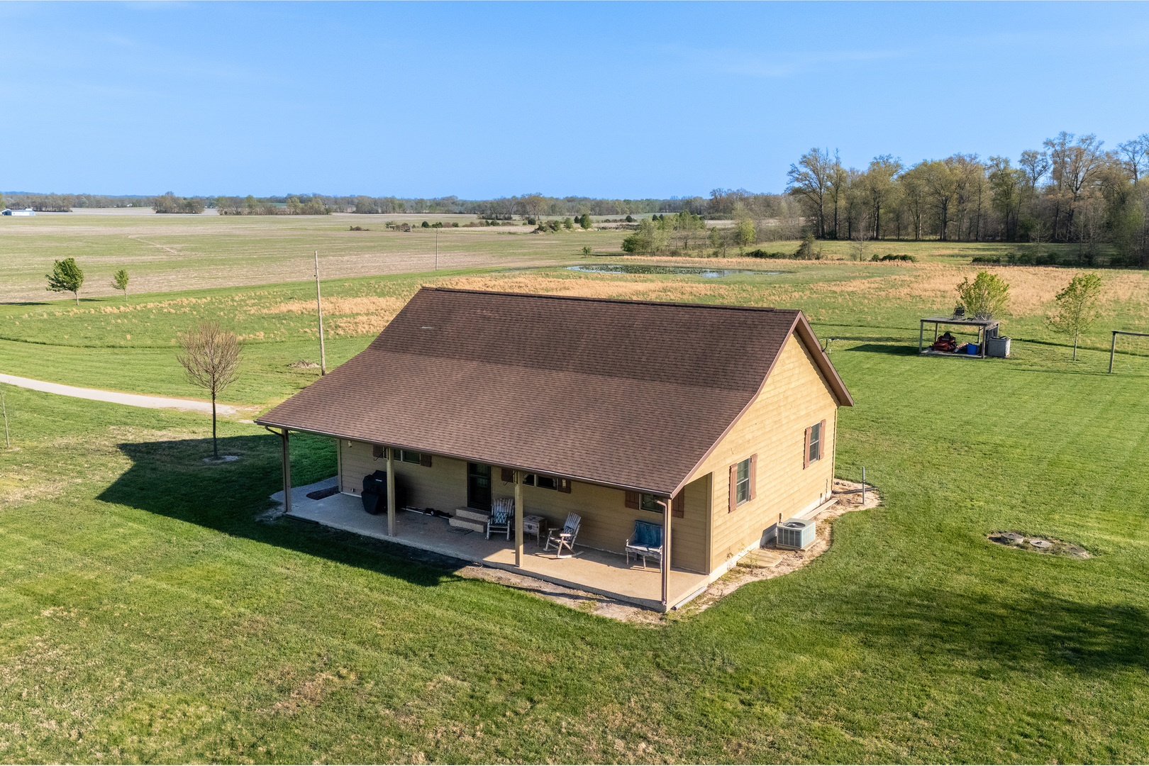 9242 East Park Street Road Du Quoin, IL 62832 - Photo 43 of 44 a view of a house with a yard and lake view