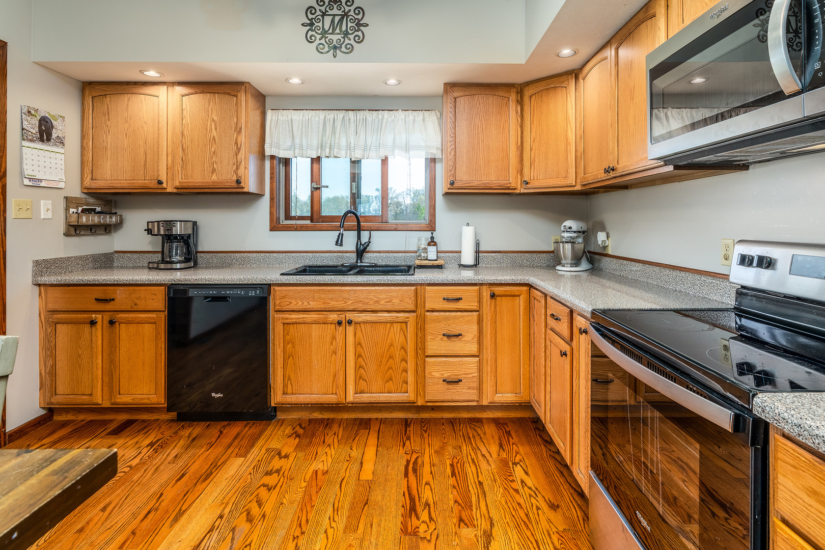 9242 East Park Street Road Du Quoin, IL 62832 - Photo 10 of 44 a kitchen with a sink a stove and cabinets