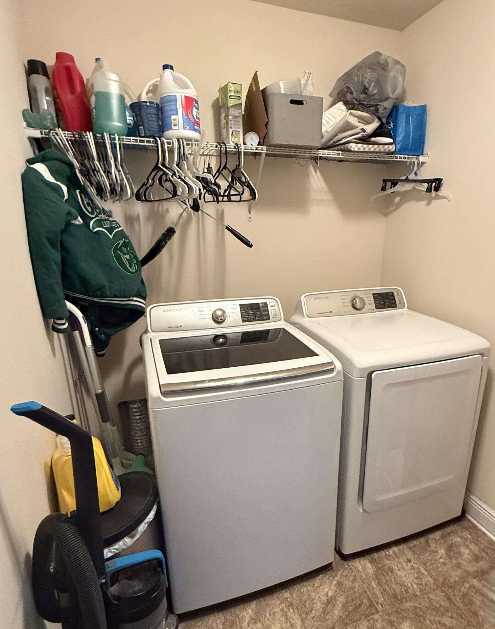 2177 Southeast Dolphin Road Port St. Lucie, FL 34952 - Photo 8 of 13 a utility room with dryer and washer