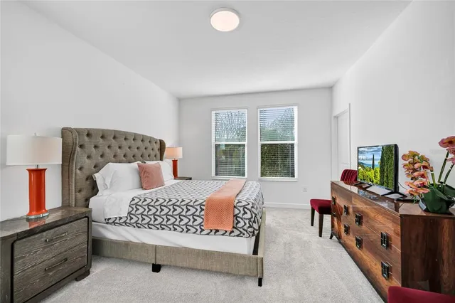 an aerial view of a swimming pool and outdoor space