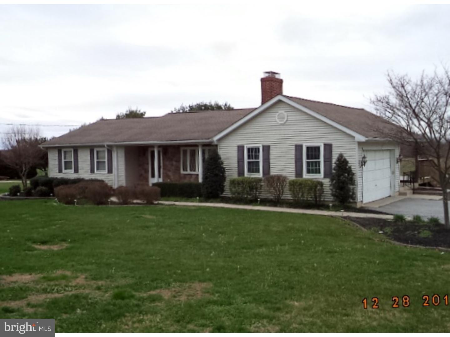 210 Shoemaker Road Bridgeton, NJ 08302 - Photo 2 of 22 a front view of a house with a garden