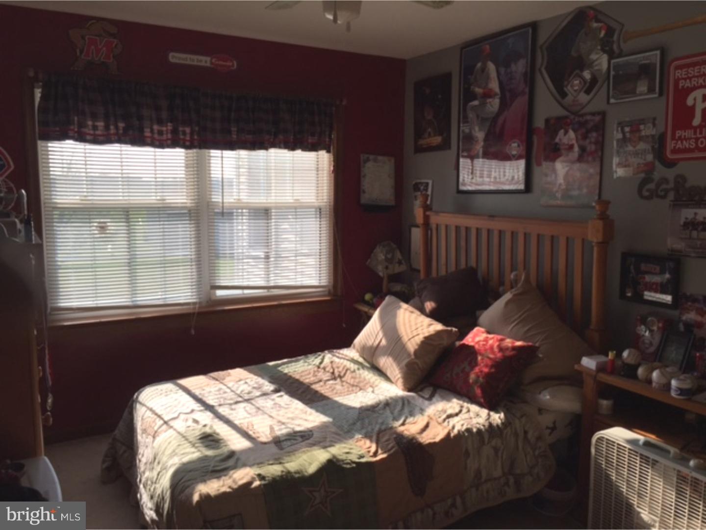 210 Shoemaker Road Bridgeton, NJ 08302 - Photo 15 of 22 a bedroom with a bed and window