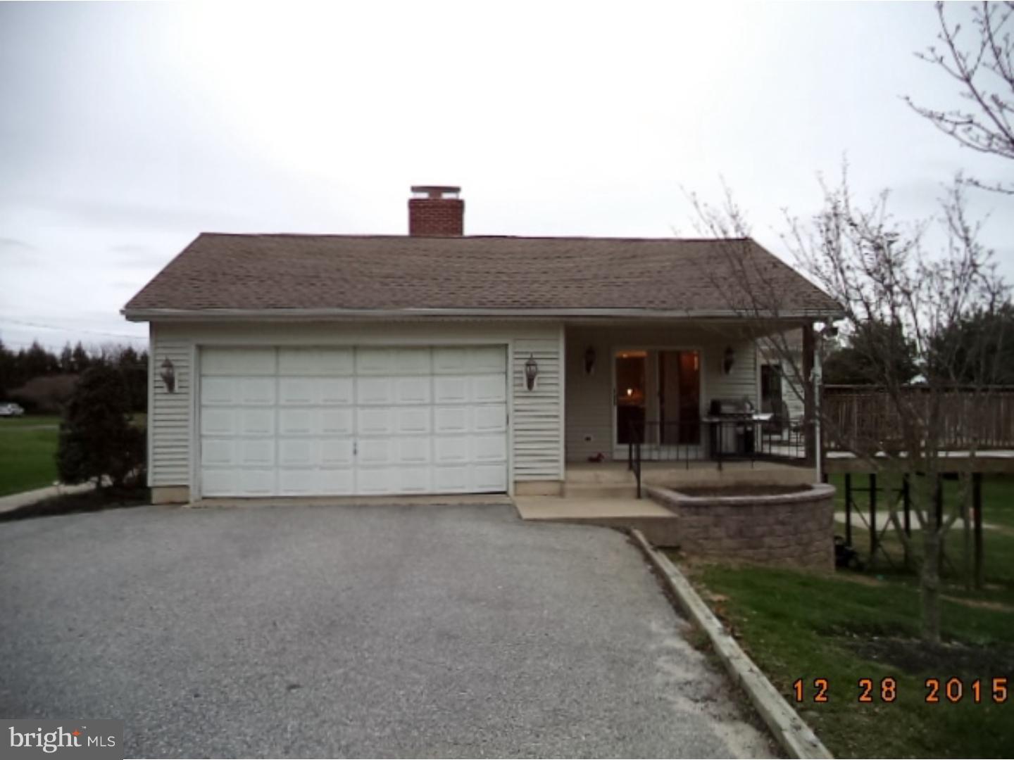 210 Shoemaker Road Bridgeton, NJ 08302 - Photo 3 of 22 a front view of a house with garden