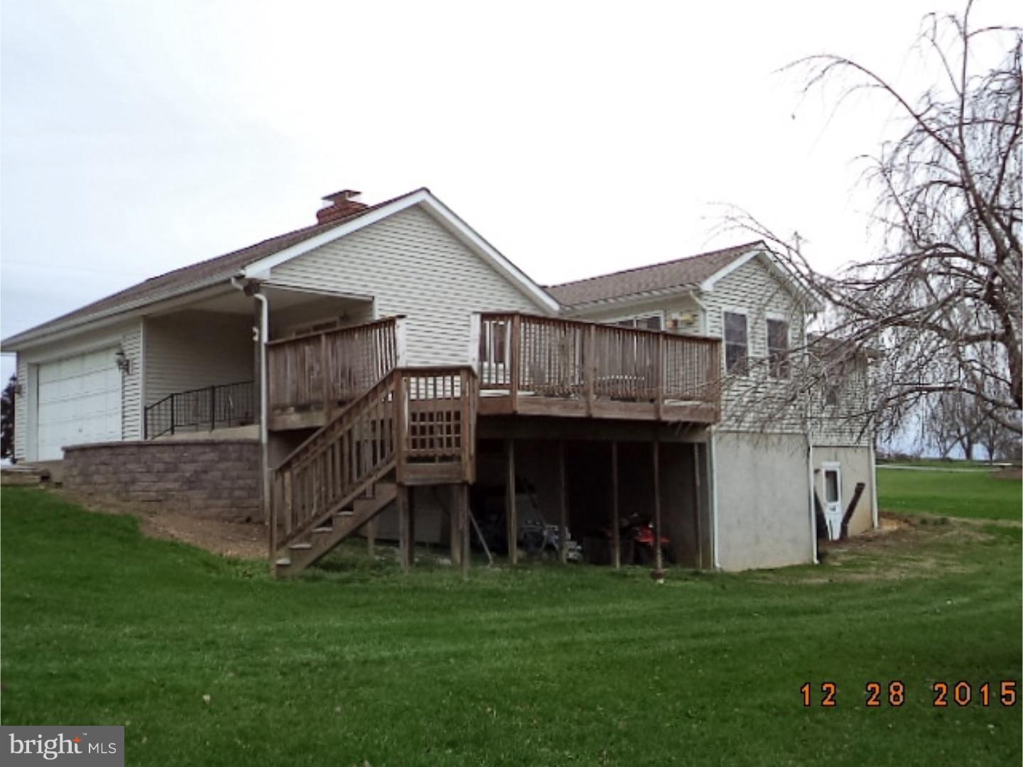 210 Shoemaker Road Bridgeton, NJ 08302 - Photo 21 of 22 a view of a big house with a big yard and large tree