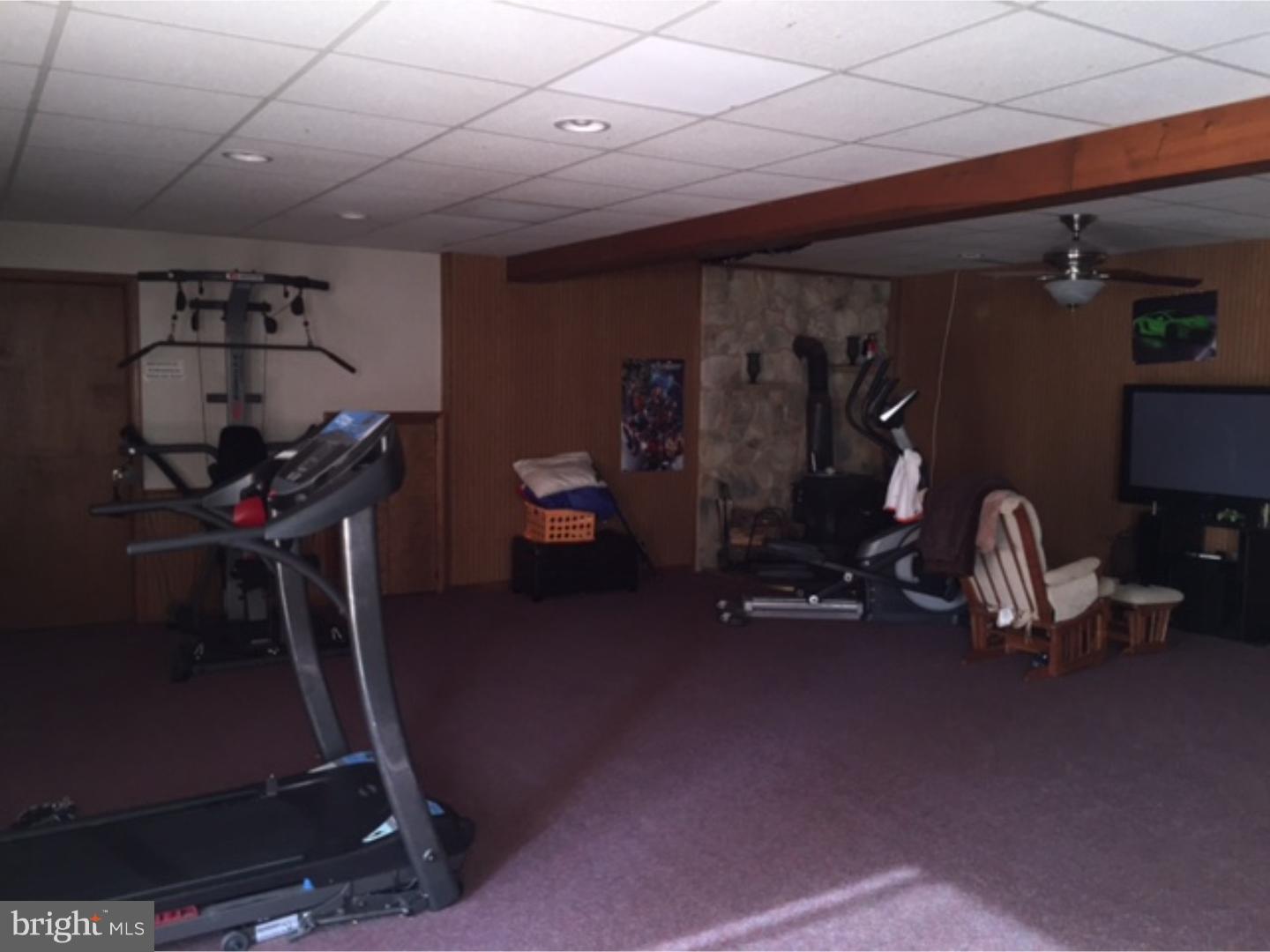 210 Shoemaker Road Bridgeton, NJ 08302 - Photo 10 of 22 a room with gym equipment