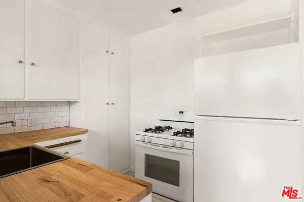 a room with storage and utility