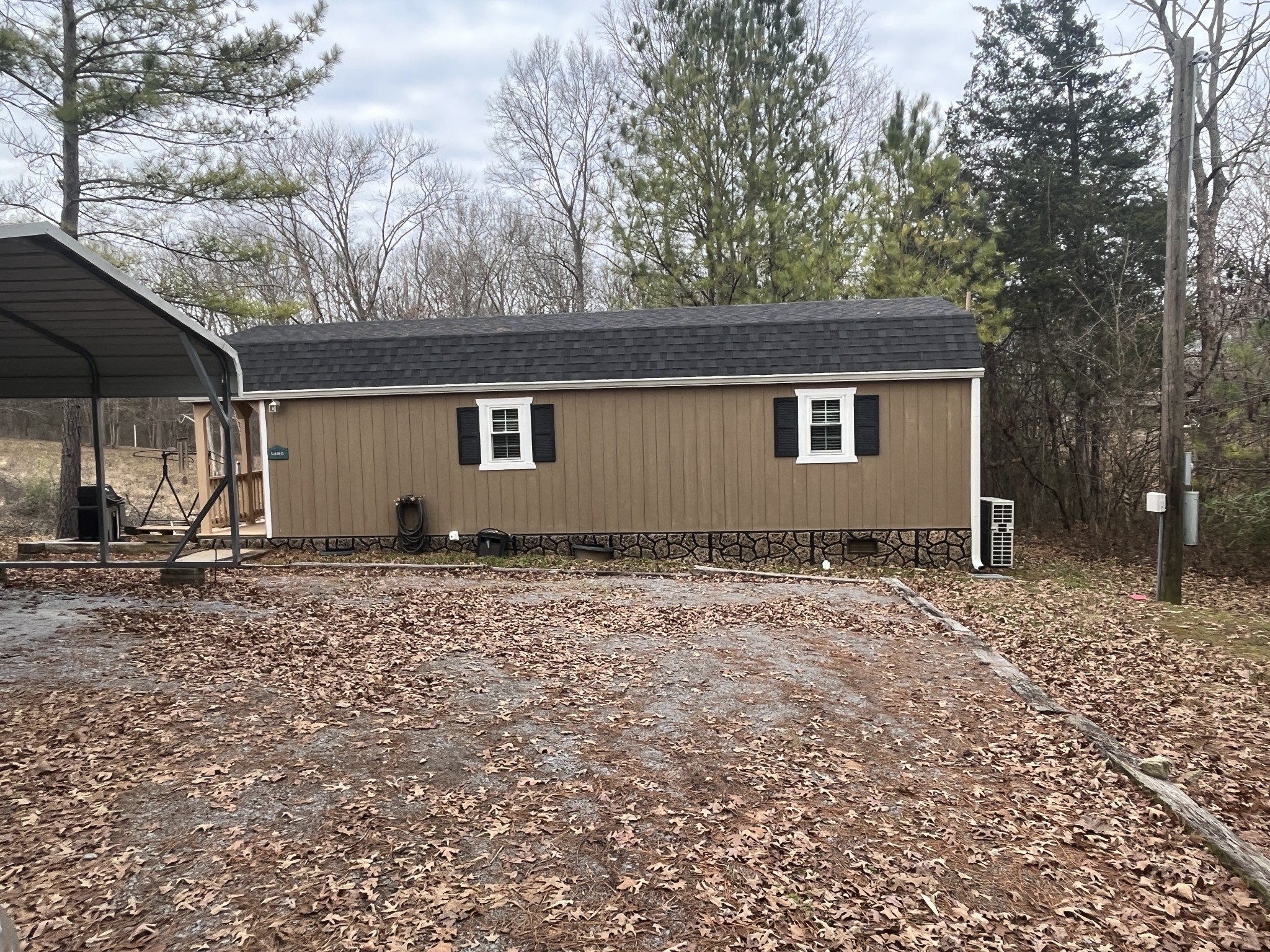 2694 Sims Road Shelbyville, TN 37160 - Photo 3 of 10 a backyard of a house with lots of green space