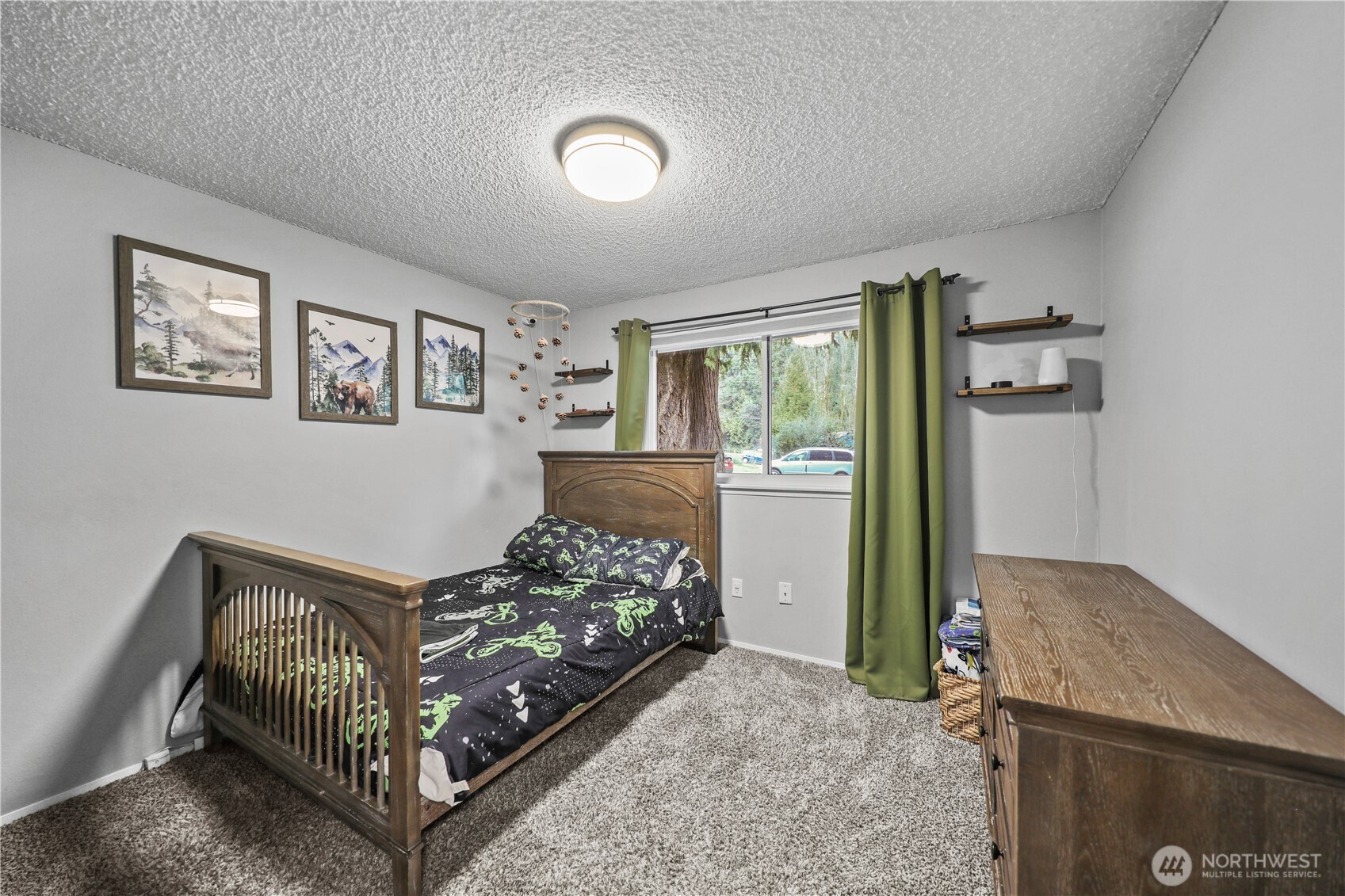 203 South 357th Street Federal Way, WA 98003 - Photo 17 of 28 a bedroom with furniture and a window