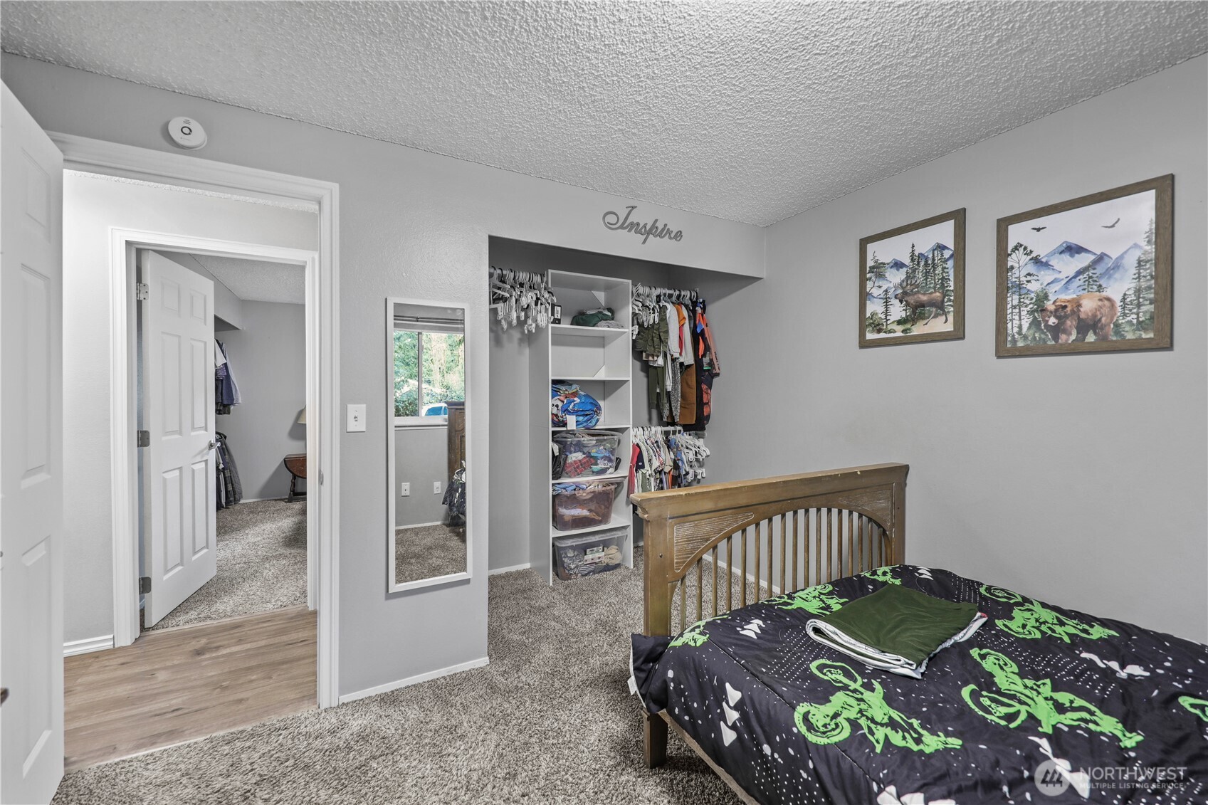 203 South 357th Street Federal Way, WA 98003 - Photo 18 of 28 a bedroom with furniture and a wooden floor