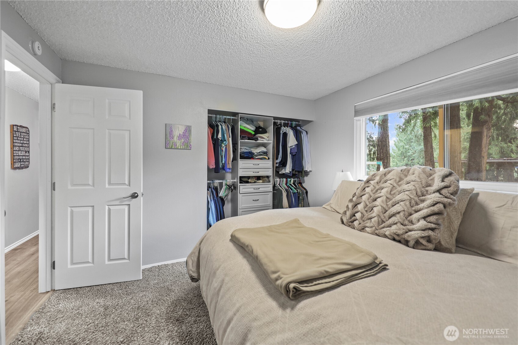 203 South 357th Street Federal Way, WA 98003 - Photo 19 of 28 a bedroom with a large bed and a window