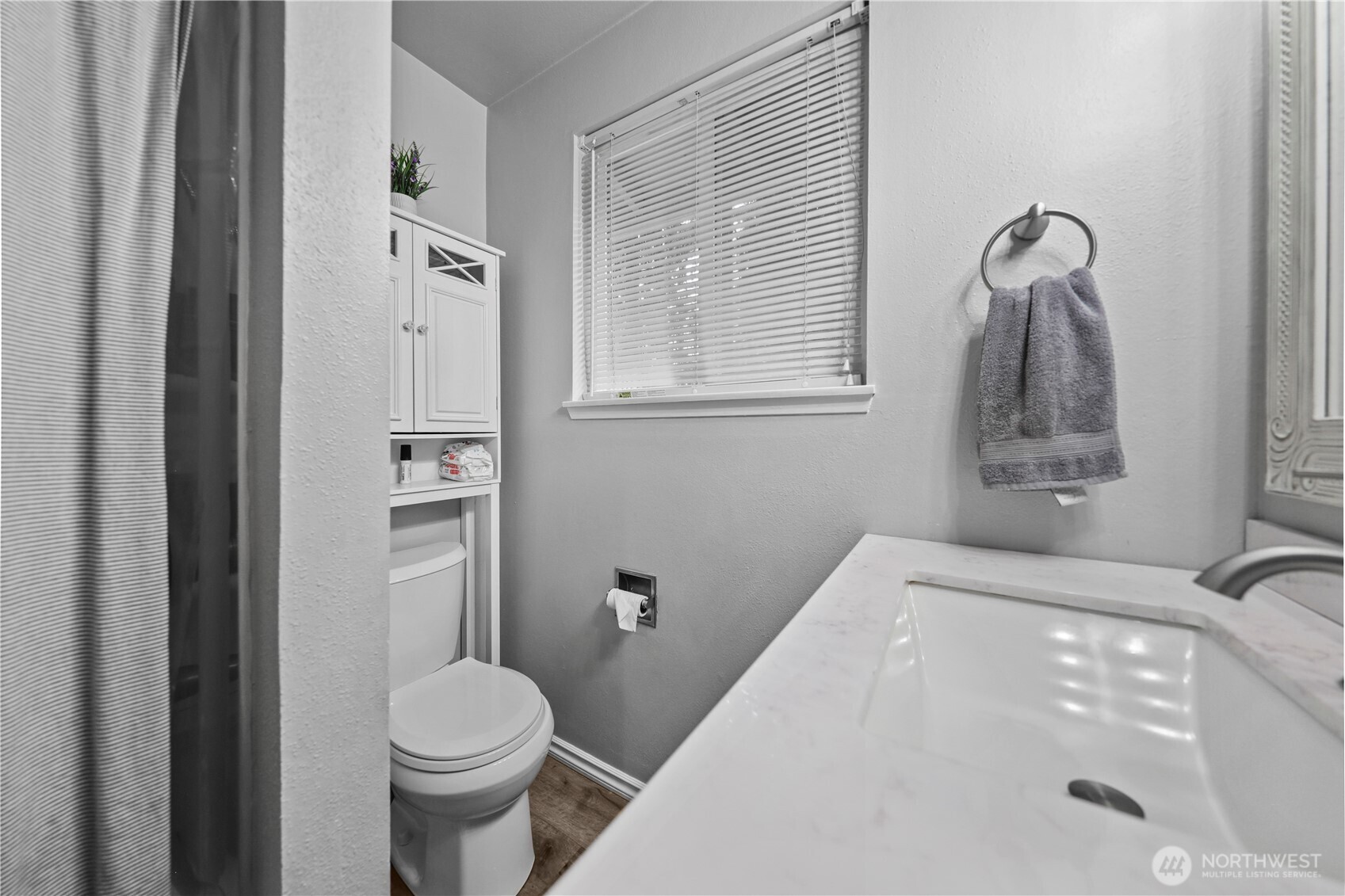 203 South 357th Street Federal Way, WA 98003 - Photo 23 of 28 a bathroom with a sink and toilet