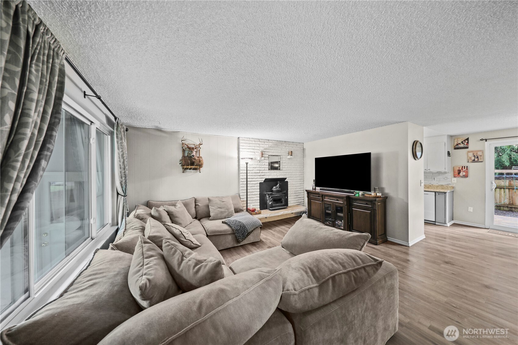 203 South 357th Street Federal Way, WA 98003 - Photo 6 of 28 a living room with furniture and a flat screen tv
